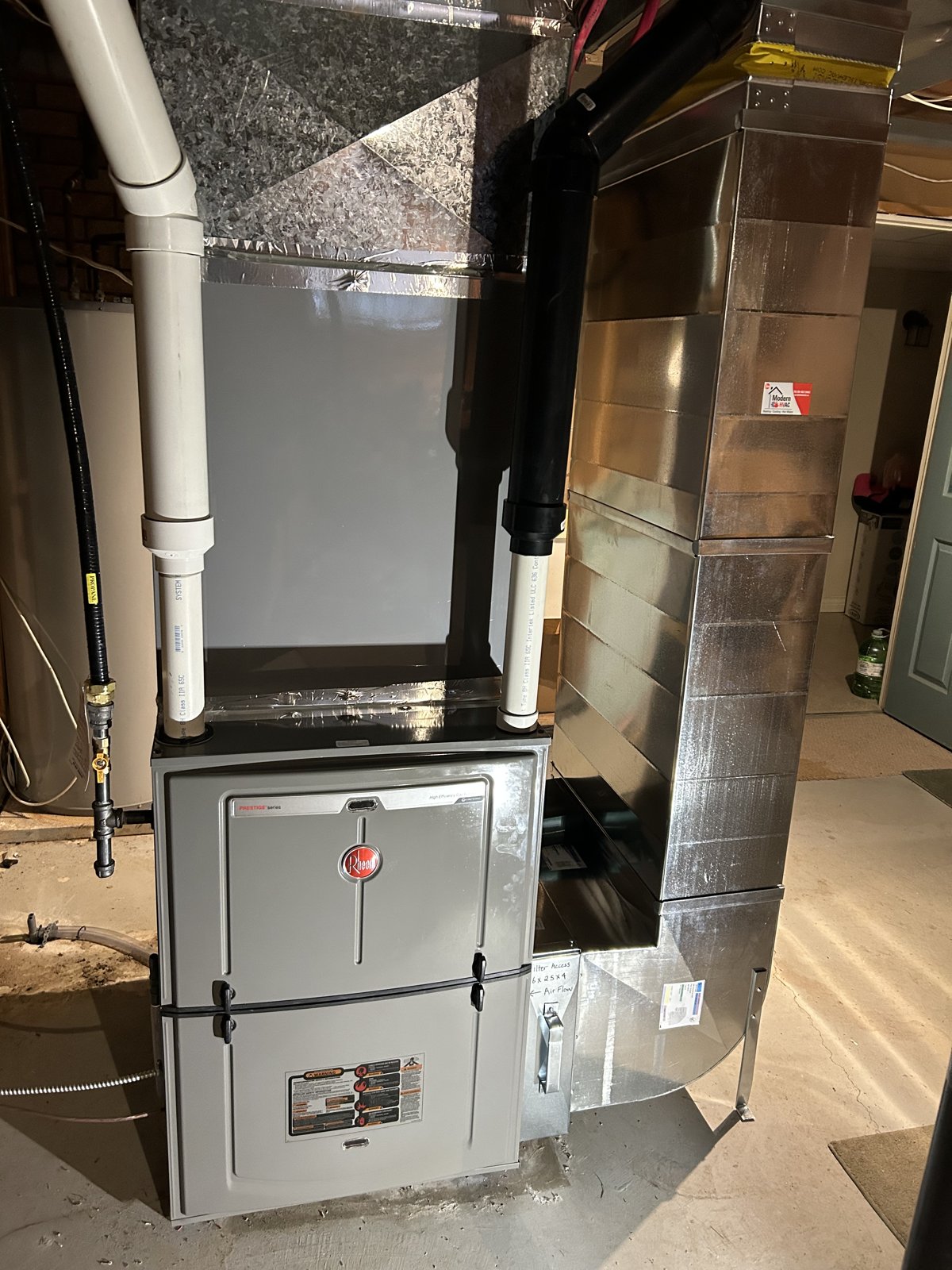 Furnace and indoor coil from the confirmed Modern HVAC dual-fuel installation