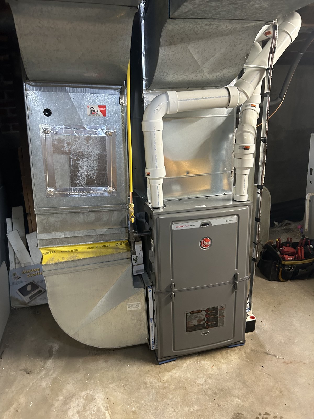 Modern HVAC Rheem furnace installation