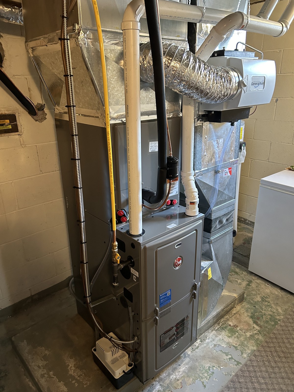 Rheem furnace installation with ductwork and humidifier