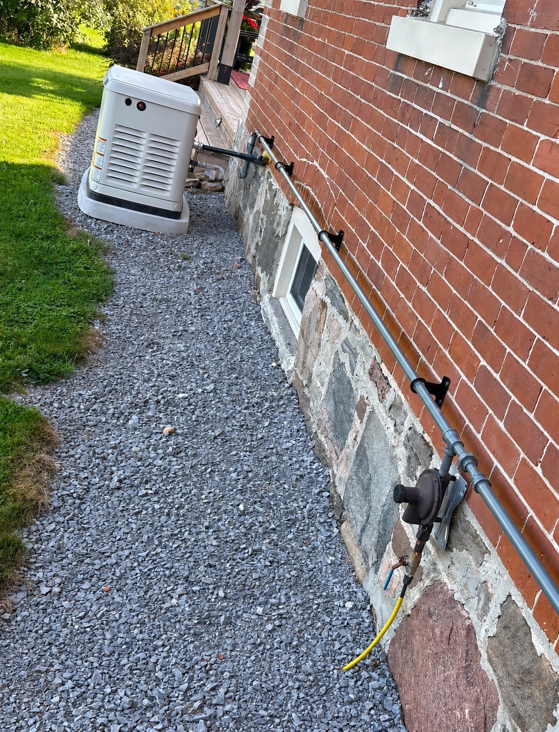 Exterior gas piping connected to a standby generator