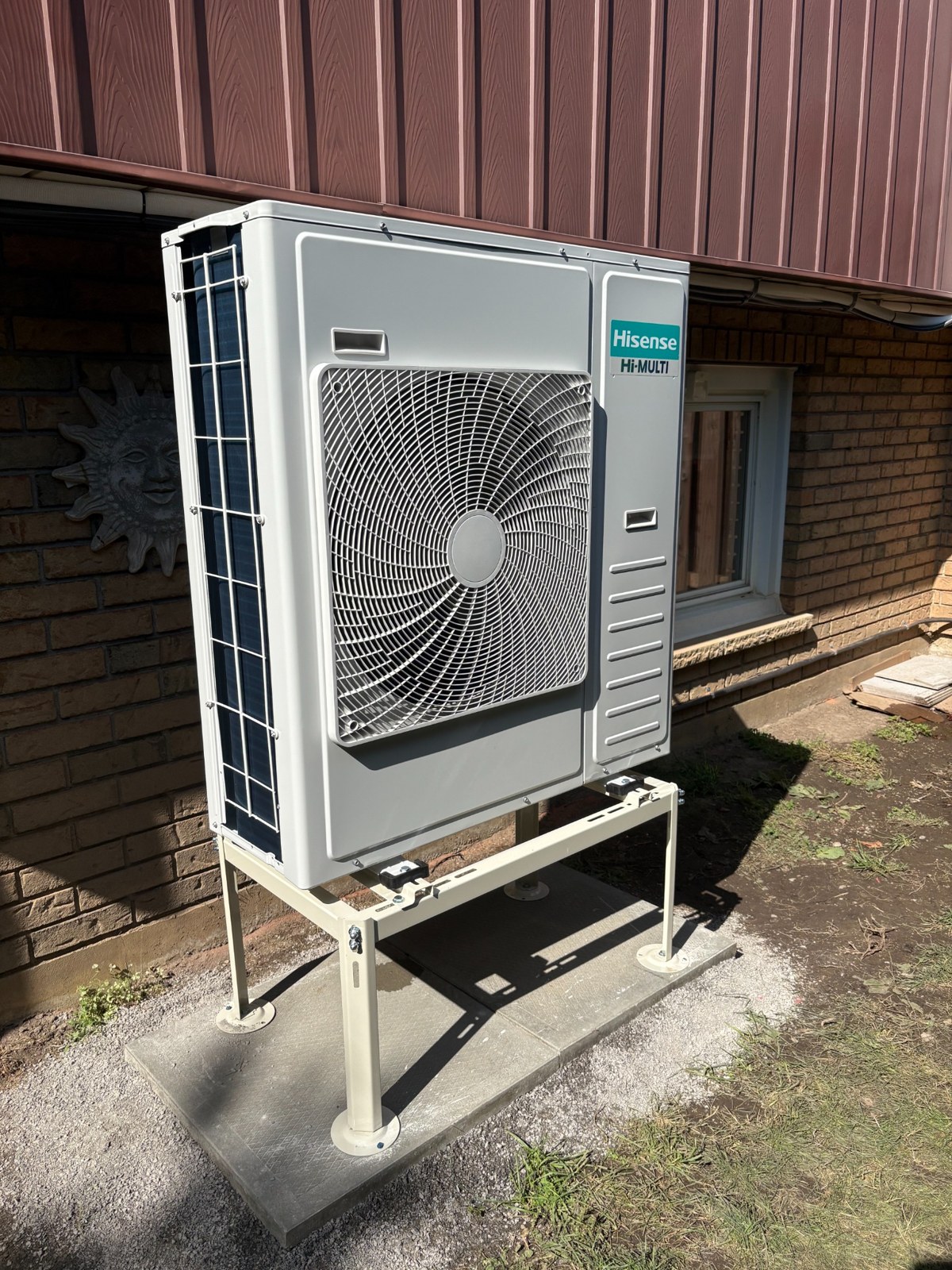 Hisense Hi-Multi outdoor unit on a raised stand — ductless / multi-zone installation
